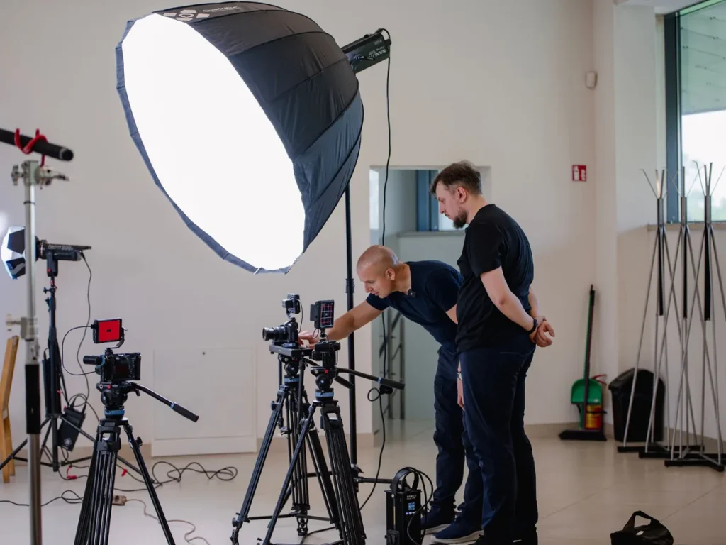 Mačiukas Media crew setting up cameras, lights and sound for an interview shoot