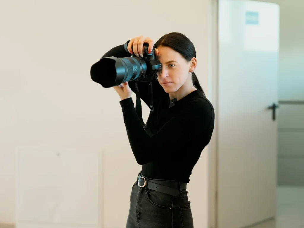 Photographer Gabija Barštytė shooting stills on set